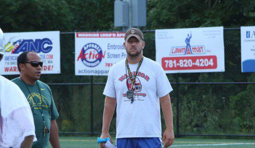 WARRIOR HEAD Coach Steve Cummings (right) has welcomed back several assistants from last year's team including Offensive Coordinator Ruben Reinoso (left). Cummings also has several new additions to his staff. (Donna Larsson Photo)