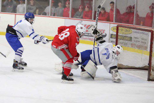 SENIOR CAPTAIN Steve Marino put the Warriors up 2-1 in yesterday morning’s holiday tourney tilt against Danvers. (Donna Larsson Photo)