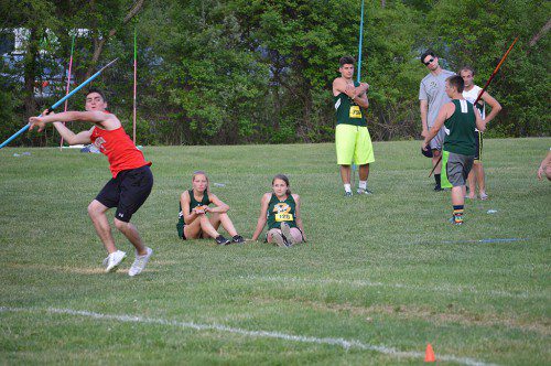 KEVIN RUSSO, a senior, finished ninth overall in the javelin at the New England Outdoor Track and Field Championships.