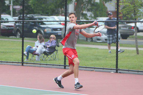 JACK MAYS came up a winner in second singles for the MHS boys' tennis team in their win over Danvers. (Donna Larsson photo) 