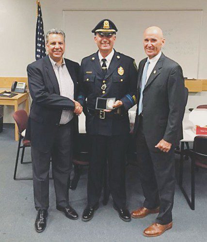 SERGEANT MATTHEW MAGLIO of the Wakefield Police Department is congratulated on his retirement by Town Administrator Stephen P. Maio (left) and Police Chief Rick Smith. Sgt. Maglio’s career in law enforcement spanned 32 years.