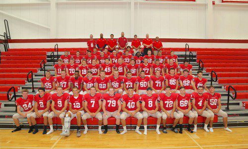 THE WMHS football team is playing for an outright claim to the Middlesex League Freedom division title in the 57th annual Thanksgiving Day Classic. In the first row (from left to right) are John Stanfield, Carmen Sorrentino, Pat Leary, Kobey Nadeau, Alex McKenna, Joe Connell, PJ Iannuzzi, Joe Marinaccio, Tom Hayes, Scott Cooley, Will Shea and Mike Powers. In the second row (from left to right) are Dan Catalo, Brendan Coughlin, junior Marc Biennestin, Jimmy Chesna, Bobby Young, Steve Mercurio, Christian Hayes, Steve Calandra, Charlie Senior, Jack Shannon, Pat Beaver and Kendall Hiltpold. In the third row (from left to right) are Bobby Keegan, Pat Bertini, Robert Guida, Henry Stikeman, Alex Joly, Tyler Ford, Ryan Fitzpatrick, Devin O’Brien, Brendan Marshall, Andrew Miller and Jake Dennen. In the fourth row (from left to right) are Derek DiMascio, Mike Lucey, Tommy Mottl, Brian McGunigle, Billy O’Keefe, Dan Marinaccio, Trevor Noble, Owen Slattery, Tyler Gilson and Ryan Cobb. In the fifth row (from left to right) are Tristen Coughlin, Nolan O’Callahan, James Shaw, Marco Sukkar and Mike Melito. In the back row (from left to right) are Special Assistant to the Head Coach Joe Elcewicz, Assistant Coach Sean Smith, Assistant Coach Chris Tolios, Head Coach Steve Cummings, Assistant Coach Anthony LaFratta, Assistant Coach Rich Moran and Assistant Coach Ruben Reinoso. Missing from the photo are Pat Tannian, Assistant Coach Doug Gallant and Assistant Coach Justin Berry. (Donna Larsson File Photo)