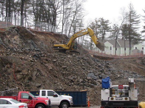 A LARGE BACKHOE continues excavation of the future site of Hallmark Health's medical office building at 888 Main St. in Greenwood. (Mark Sardella Photo)